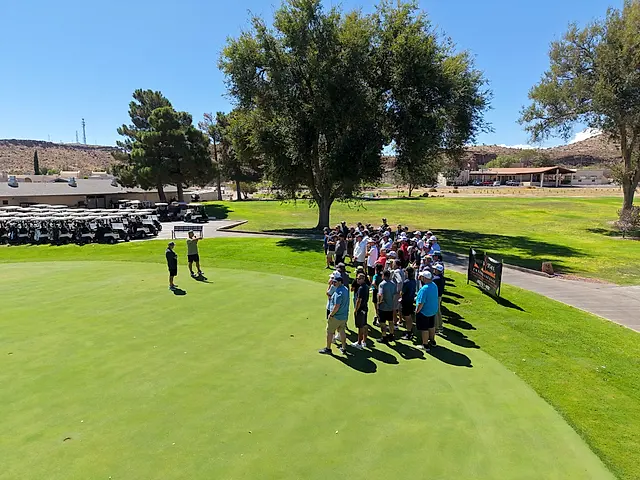 Golfers and partners on the course at the King of the Desert Classic.