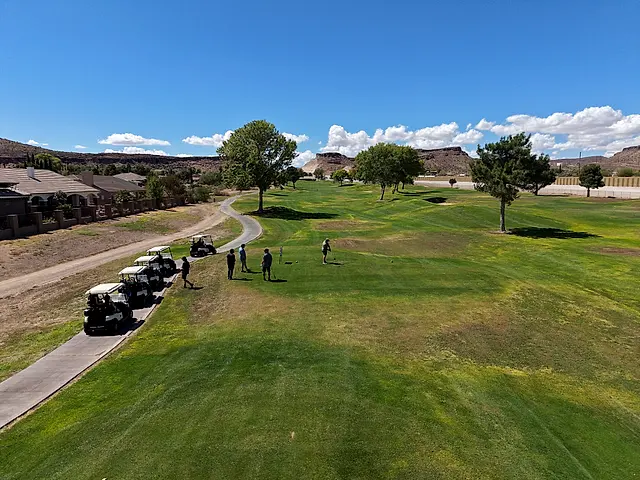 Golfers and partners on the course at the King of the Desert Classic.