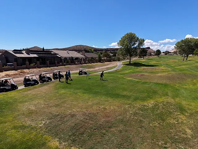 Golfers and partners on the course at the King of the Desert Classic.