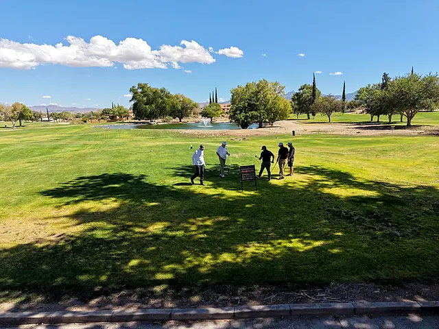Golfers and partners on the course at the King of the Desert Classic.