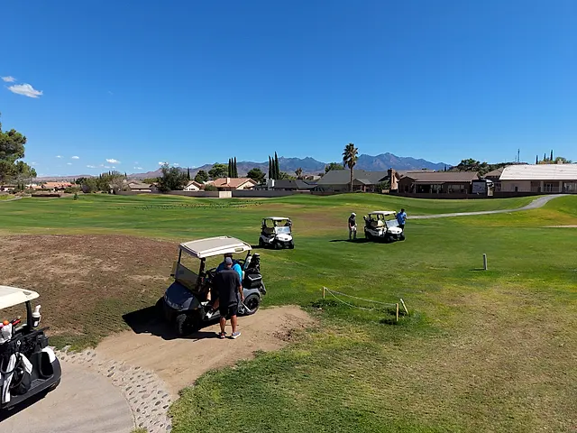 Golfers and partners on the course at the King of the Desert Classic.