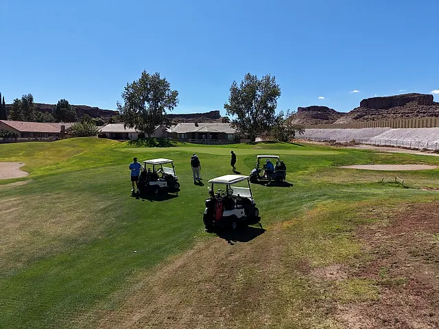 Golfers and partners on the course at the King of the Desert Classic.