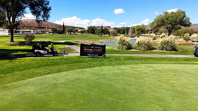 Golfers and partners on the course at the King of the Desert Classic.