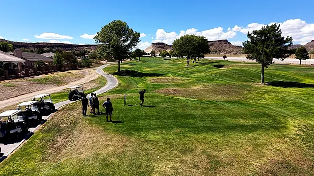 Golfers and partners on the course at the King of the Desert Classic.