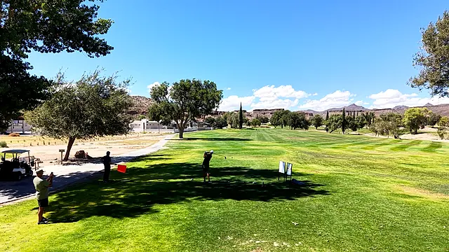 Golfers and partners on the course at the King of the Desert Classic.