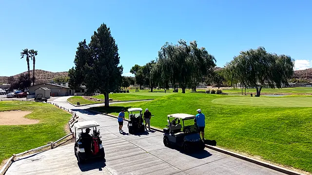 Golfers and partners on the course at the King of the Desert Classic.