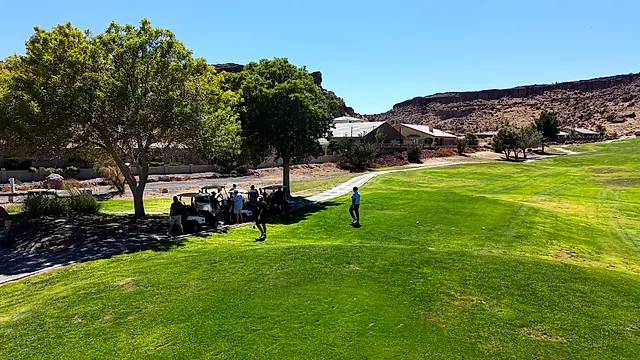 Golfers and partners on the course at the King of the Desert Classic.