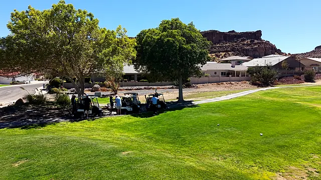 Golfers and partners on the course at the King of the Desert Classic.