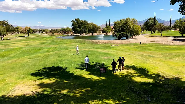 Golfers and partners on the course at the King of the Desert Classic.