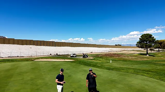 Golfers and partners on the course at the King of the Desert Classic.